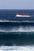 Sao Miguel Island,Azores,Portugal. Ribeira Grande. Wave and fishermen