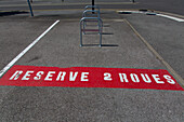 Parking space reserved for two-wheeled vehicles