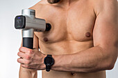 Muscle massage gun for muscle recovery and against muscle soreness