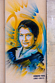 Portrait of Simone Veil painted on a wall