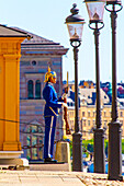 Europe,Scandinavia,Sweden. Stockholm. Old Town. Gamla Stan. Gamla Stan district. Royal palace. Swedish guard in blue uniform