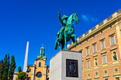 Europe,Scandinavia,Sweden. Stockholm. Statue of Charles XIV John at Slussplan. Gamla Stan district. Storkyrkan Cathedral. Royal palace