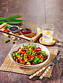 Spicy rice noodles with rump steak and peppers