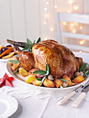 Roast turkey with roast potatoes and sage