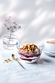 Breakfast smoothie bowl with granola and yoghurt