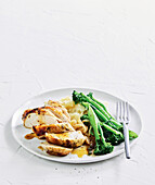 Lemon and herb roast chicken with broccolini and mashed potatoes