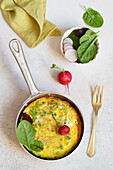 Omelette with leek peas and caciocavallo