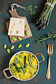 Saffron risotto with asparagus, broad beans and Emmental cheese