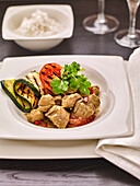 Lamb curry with grilled vegetables and rice