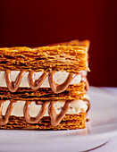 Mille-feuille with vanilla cream and praline sauce