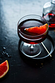 Negroni cocktail with pink grapefruit