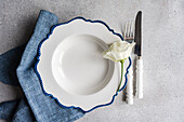 Minimalist table decoration with white azalea flower