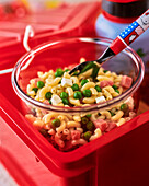 Pasta salad with ham, peas and cheese