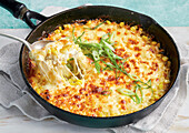 Korean corn stew topped with cheese