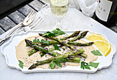 Green asparagus with tuna sauce