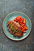 Roasted duck breast with tomato salad