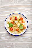 Spaghetti with cherry tomatoes and mozzarella