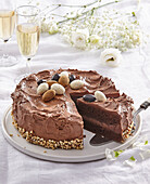 Chocolate cream cake with chocolate almonds