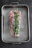 Raw veal shank with fresh rosemary