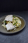 Steamed Baltic cod with pointed cabbage and smoky broth