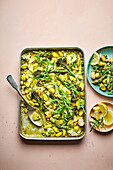 Gnocchi casserole with spring vegetables and pesto