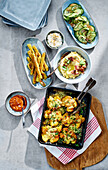 Smashed potatoes with mountain cheese, potato sticks and mashed potatoes