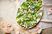 Herb salad with yoghurt-rose dressing