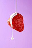 Free-floating strawberry with cream