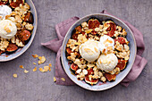 Fig crumble bowl with vanilla ice cream and almond slivers