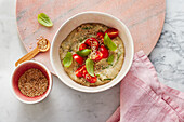 Oat bran porridge with tomatoes and basil