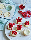 Cheesecake muffins with berry sauce