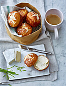 Pretzel roll with cream cheese and camembert