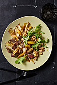 Poultry liver with chicory, orange and walnuts