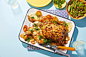 Spatchcock chicken piccata with bean and hazelnut salad