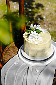 Cake decorated with apple blossoms