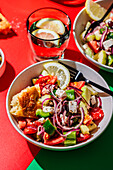 Greek salad with feta, olives and flatbread