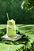 Iced matcha latte with oat drink