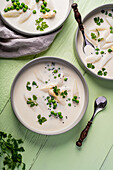 White asparagus soup with green peas