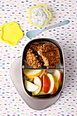 Lentil patties with apple slices and dip