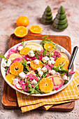 Salad with apple, mandarins, onions and feta