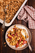 Peanut butter crumble with apples, almonds and honey yoghurt