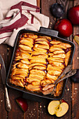 Sweet rice pudding casserole with chocolate and apples