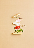 Sandwich ingredients: Baguette, ham, tomato, cream cheese and salad