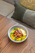 Lemon and garlic chicken with saffron rice