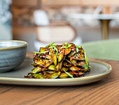 Spicy edamame with sesame seeds and spring onions