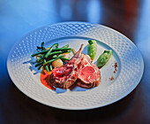 Rack of lamb with green beans and mint and pea puree