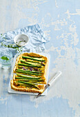 Asparagus quiche with Gouda cheese and red onions