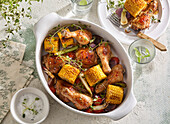 Chicken thighs with sweetcorn, tomatoes and fresh herbs