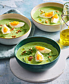 Cold cucumber soup with hard-boiled egg and walnuts