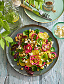 Potato salad with feta, chickpeas and red onions